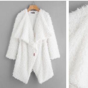 Fuzzy, white waterfall coat